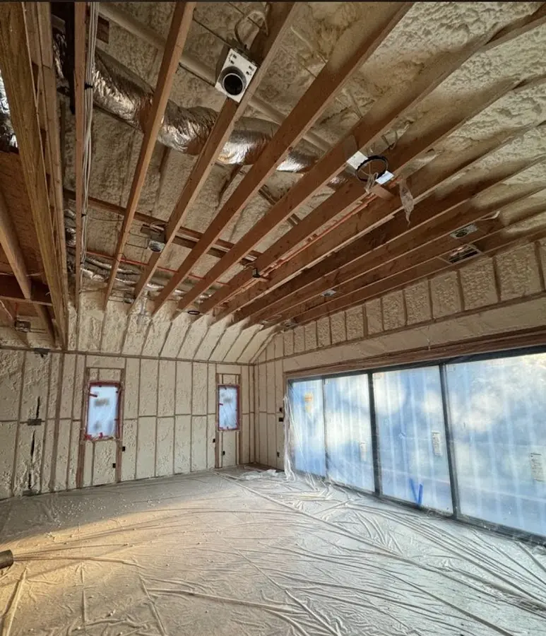 Interior walls and ceiling insulated with spray foam during new construction in Five Forks